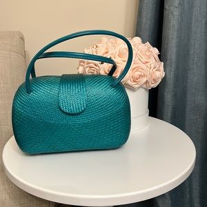 Teal woven handbag